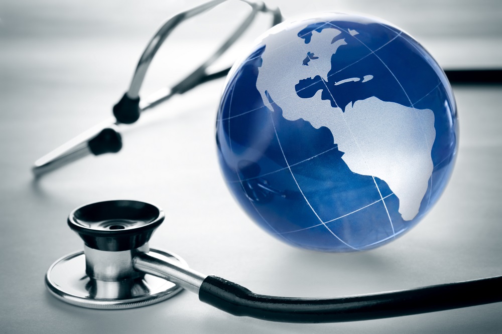 A world globe and a stethoscope